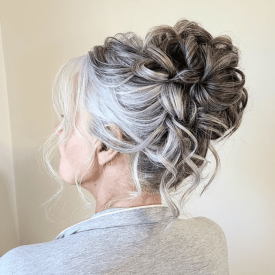 Romantic, Textured High Updo on Mother of the Groom